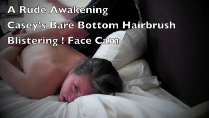 A RUDE AWAKENING - CASEY BARE BOTTOM HAIRBRUSH AND PAJAMA SPANKING Front Camera